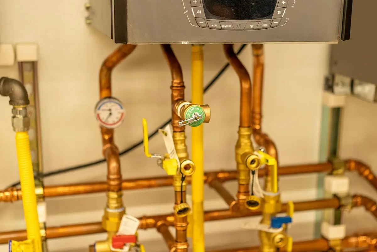 Licensed technician providing Water Heater Installation for a homeowner in East Rockingham